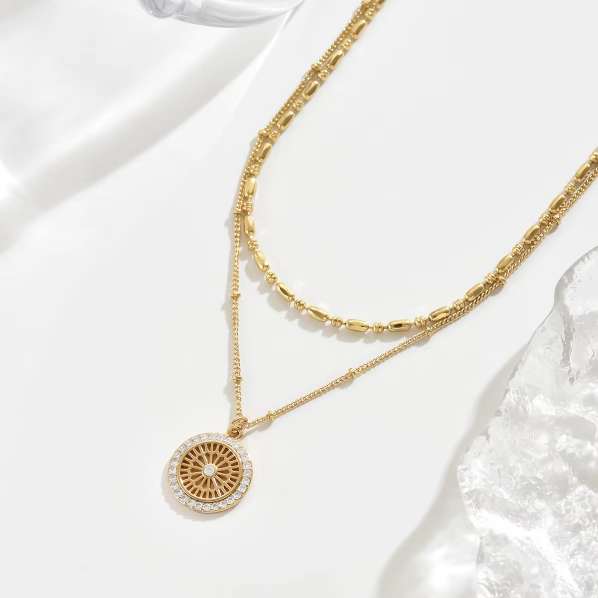 Elegant Gold Layered Necklace Set with Crystal Medallion Pendant - Image 2